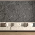 Beige Sectional Sofa Against Gray Stone Wall With Light Wooden Floor Brown White Gray Cushions
