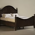 Elegant Dark Wooden Double Bed With Carved Headboard Footboard And White Pillows