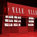 Red Art Installation Featuring ELLE Logo With Display Shelves Holding Items 3d model