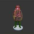 Military Figure Model In Camouflage Uniform With Fur Hat On White Base