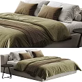 Comfortable Double Bed With Green Velvet Duvet Brown And Gray Pillows And Side Table