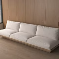 White Fabric Three Seater Sofa With Wooden Frame Against Wooden Wall And Window