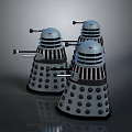 Three Metallic Robot Models With Dome Heads Circular Holes Mechanical Arms And Black Bases