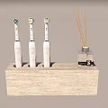 Daily Washing Supplies Three Electric Toothbrushes and Fragrance Diffuser on Wooden Base