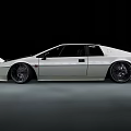 Silver Vintage Sports Car With Round Headlights And Custom Wheels On Night Street