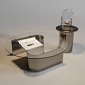 Modern Coffee Table With Glass Top Metal Frame And Open Magazine