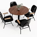 Round Walnut Dining Table With Black Chairs Wooden Armrests And Metal Legs
