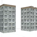 Two Side by Side Multi Story Apartment Buildings With Gray Exterior And Multiple Windows