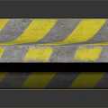 Gray Concrete Traffic Barrier With Yellow Diagonal Stripes For Road Safety