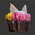 Colorful Unicorn Themed Cupcake With Multicolored Frosting And Decorative Toppings