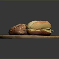 Fresh Homemade Breads on Wooden Round Tray One with Pumpkin Seeds and Sliced with Cheese
