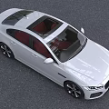 White Jaguar Sedan Modern Sporty Design With Red Interior Alloy Wheels And Front Grille