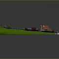 Miniature Residential Community Model With Houses Green Lawns Roads And Vehicles