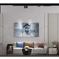 Modern Studio Apartment Interior With Bed Sofa Wooden Desk Artworks And Gray Tones Lighting