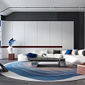 Modern Living Room Interior With White Sofa Blue Decor Circular Rug And Blue Bookshelf