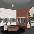 Modern Clothing Store Interior With Clothes On Display Bean Bag And Decorative Plants