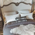 Elegant Modern Bedroom Interior With Bedside Tables Table Lamps Area Rug And Accent Chair