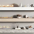 Three Modern Fireplaces With Flames Marble And Wooden Shelves Decorative Vases Bowls And Books