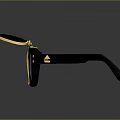 Fashionable Vintage Sunglasses With Black Frame Gold Accents And Tinted Lenses