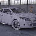 Orange Renault Megane Coupe in Industrial Garage Setting With Sleek Exterior Design