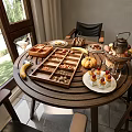 Delicious Food Assortment On Wooden Round Table With Bananas Nuts Fresh Fruits And Teapot