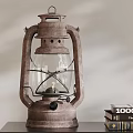 Vintage Metal Kerosene Lamp On Dark Table With Stacked Books
