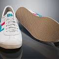 White Shoes With Blue And Red Stripes White Laces Brown Textured Sole With Grid Pattern