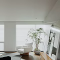 Minimalist Living And Dining Room With Light Sofa Wooden Coffee Table And Gray Rug