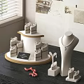 Elegant Jewelry Display With Necklace Earrings Rings On Stand And Table