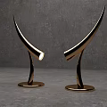 Golden Modern Curved Table Lamps With Round Base Illuminated In Room