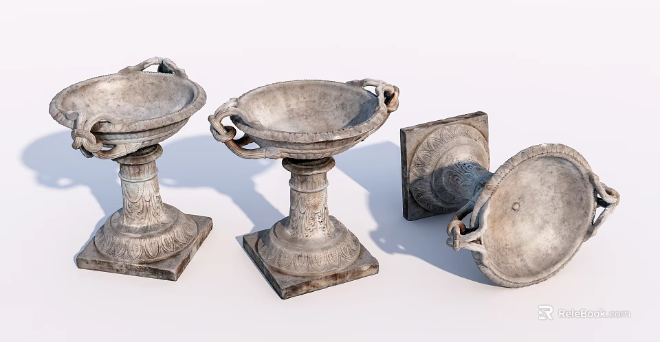 Three Piece Vintage Garden Ornaments With Carved Bases And Decorative Design 3d model 