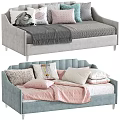 Gray and Blue Upholstered Toddler Beds with Decorative Pillows and Blankets