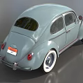 Light Blue Vintage Beetle Car With Curved Body And White Wall Tires