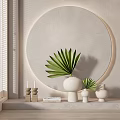 White Vases With Green Palm Leaves In Modern Interior Decor With Circular Wall And Candles