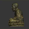 Ancient Bronze Statue of Sitting Man With Hands Clasped in Traditional Pose
