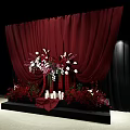 Stunning Wedding Decoration On Black Stage With Red Curtains White Flowers And Candles