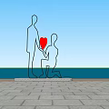 Silhouette Sculpture Featuring Kneeling Figure Holding Red Heart And Standing Person Against Sunset Sky Ocean