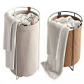 Two Different Colored Fabric Laundry Baskets With Towels And Metal Frames