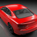 Red Audi Sports Car With Sleek Body And Aggressive Front Grille
