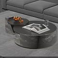 Modern Round Marble Coffee Table With Open Book Glass Of Water And Fruit Tray