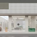 Modern Bright Clothing Store Interior With White Space Glass Displays Green Countertops And Clothing Racks