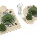 Green Dinnerware Set With Plates Bowls Cups Glasses And Utensils On Beige Placemats
