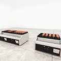 Modern Kitchen Cooktops With Black And White Design Orange Heating Elements And Knob Controls