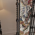 Elegant Accent Chair With Red Cushion And Floral Screen In Decorative Interior