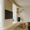 Modern Living Room Interior With Black Sofa Marble Countertop Wooden Stools Rug And Green Plants
