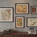 Framed Abstract Paintings With Floral Bird Bamboo Designs On Wall With Record Player Below