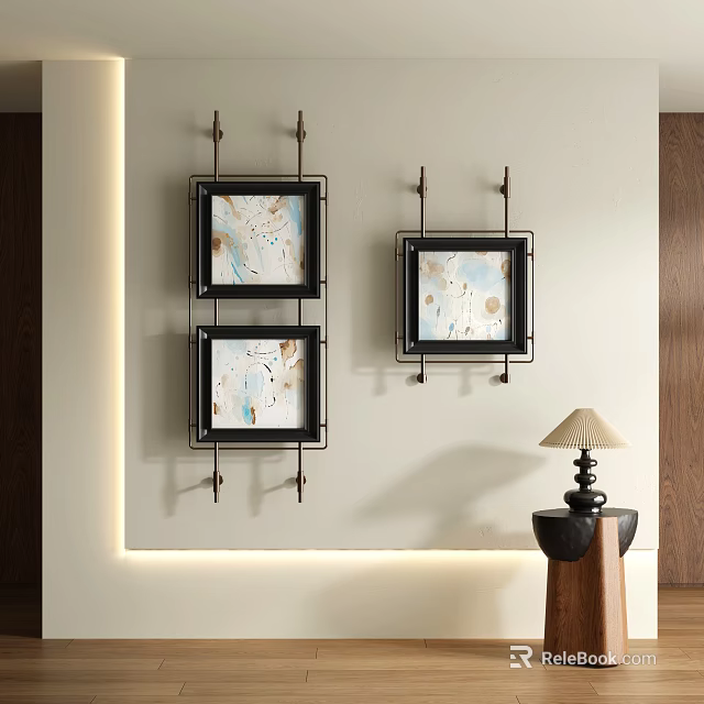 Three Abstract Paintings In Black Frames Hanging On Light Colored Wall Decorative Scene 3d model