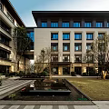 Modern Multistory Residential Exterior With Green Landscape And Leisure Seating Area
