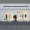 Modern Clothing Store Interior With Green Dress Mannequin Hanging Clothes And Display Racks