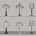 Various Stylish Table Lamps With Wooden Bases And Fabric Shades On Shelves